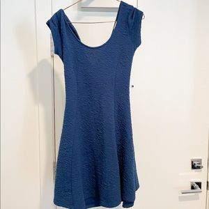 Blue t shirt skater dress with cut outs in back